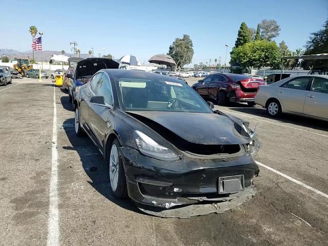 2018 Tesla Model 3 VIN: 5YJ3E1EA6JF046697 Lot: 70180504