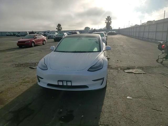 2020 Tesla Model 3 VIN: 5YJ3E1EA9LF706573 Lot: 69616164