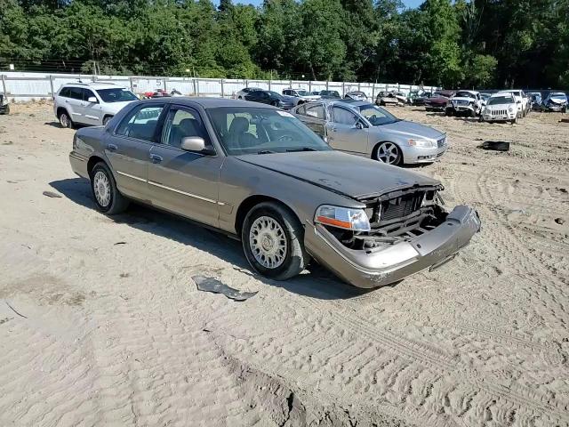 2003 Mercury Grand Marquis Gs VIN: 2MEFM74WX3X658211 Lot: 70834424