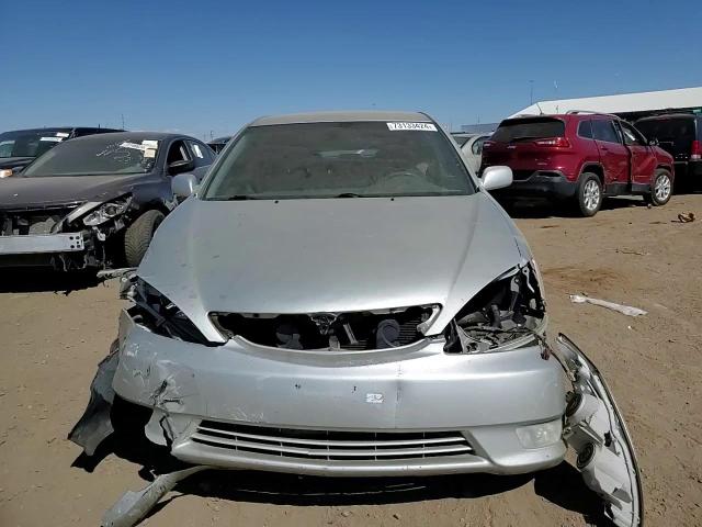 2003 Toyota Camry Le VIN: JTDBE32K130150200 Lot: 73133424