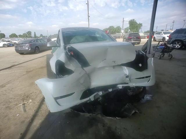 2023 Tesla Model Y VIN: 7SAYGDEE0PF893389 Lot: 72193984