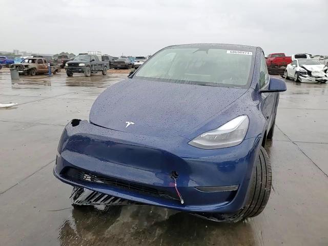 2024 Tesla Model Y VIN: 7SAYGDEE0RA310271 Lot: 68698974