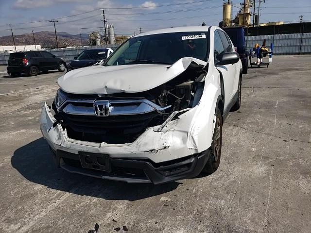 2019 Honda Cr-V Lx VIN: 2HKRW5H3XKH411655 Lot: 72724094