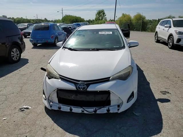 2018 Toyota Corolla L VIN: 2T1BURHE3JC087112 Lot: 69138724