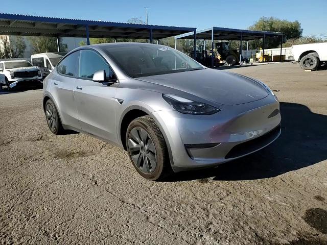 2024 Tesla Model Y VIN: 7SAYGDEE0RA299398 Lot: 73052624