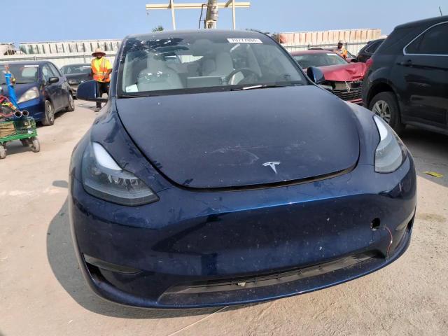 2023 Tesla Model Y VIN: 7SAYGDEF6PF908034 Lot: 70777894