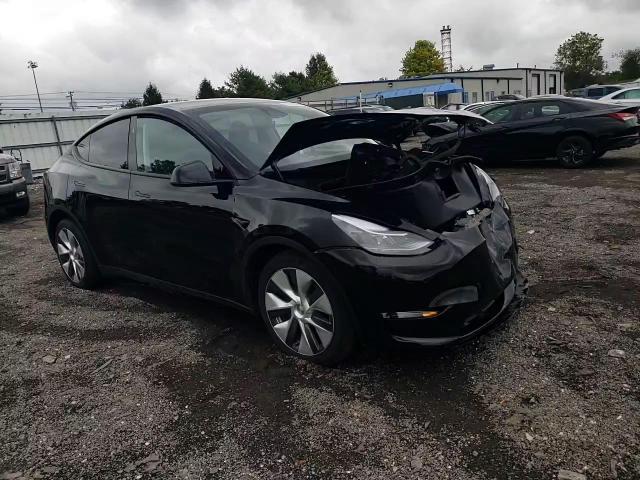 2023 Tesla Model Y VIN: 7SAYGDEE9PF867955 Lot: 71417544