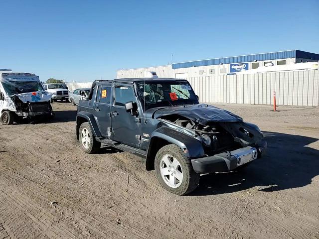 2008 Jeep Wrangler Unlimited Sahara VIN: 1J4GA59168L520695 Lot: 73187774