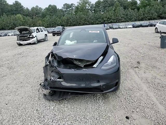 2024 Tesla Model Y VIN: 7SAYGDEE0RA226581 Lot: 70473764