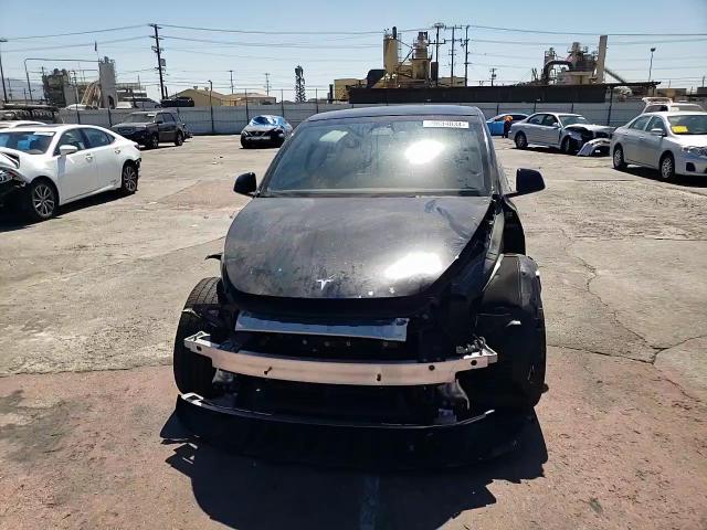 2023 Tesla Model Y VIN: 7SAYGDEE0PA026426 Lot: 69634034