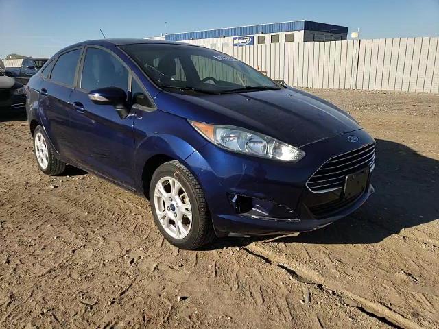 2016 Ford Fiesta Titanium VIN: 3FADP4FJ9GM127093 Lot: 70299274