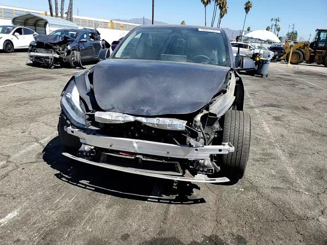 2023 Tesla Model Y VIN: 7SAYGDEE5PA053010 Lot: 70861565