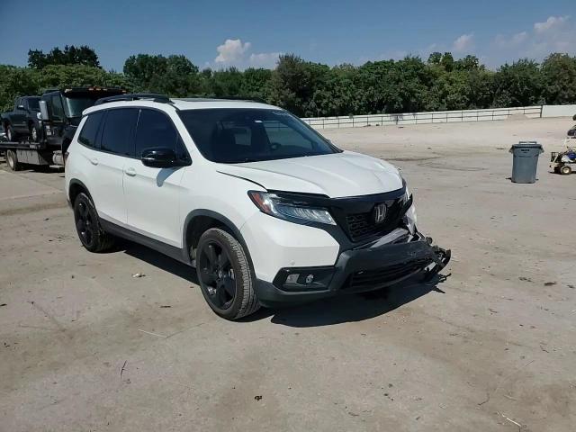 2021 Honda Passport Elite VIN: 5FNYF8H07MB010830 Lot: 81184425
