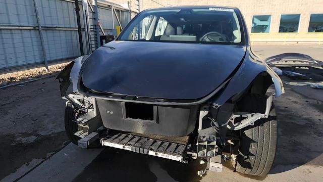 2023 Tesla Model Y VIN: 7SAYGDEE2PA199591 Lot: 82086665