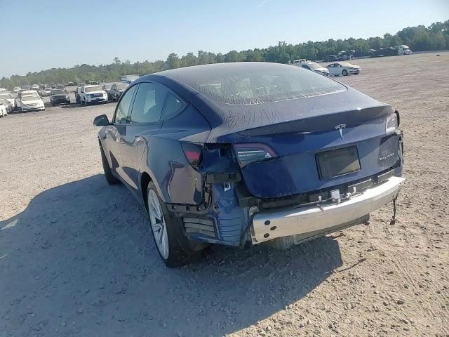 2022 Tesla Model 3 VIN: 5YJ3E1EB7NF184697 Lot: 69768635