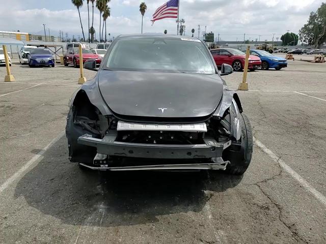2023 Tesla Model Y VIN: 7SAYGDED1PF941165 Lot: 71301845