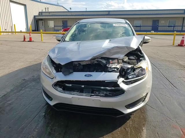 2017 Ford Focus Se VIN: 1FADP3F26HL309317 Lot: 71525115