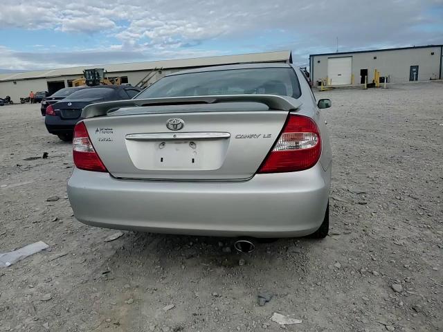 2002 Toyota Camry Le VIN: 4T1BE32K52U615869 Lot: 84017525