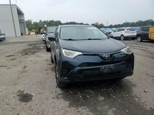 2018 Toyota Rav4 Le VIN: JTMBFREV8JJ234558 Lot: 86083955