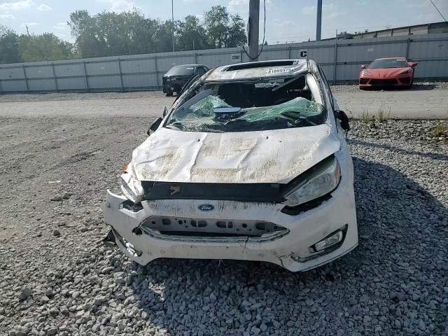 2016 Ford Focus Titanium VIN: 1FADP3N29GL303527 Lot: 81899375