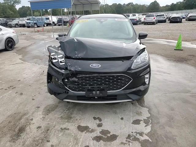 2021 Ford Escape Titanium VIN: 1FMCU9J97MUA71094 Lot: 84000995