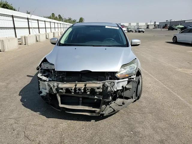 2014 Ford Focus Titanium VIN: 1FADP3J25EL407922 Lot: 71483555