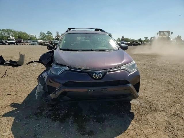 2018 Toyota Rav4 Le VIN: 2T3BFREV7JW707058 Lot: 81073705