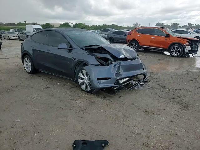 2023 Tesla Model Y VIN: 7SAYGDEE4PA168102 Lot: 80549915