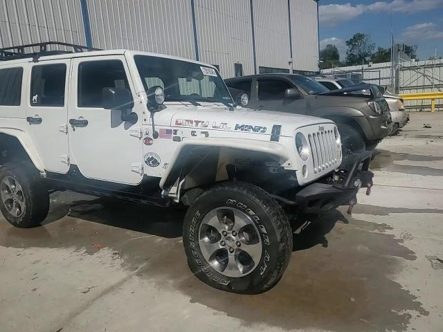 2016 Jeep Wrangler Unlimited Sahara VIN: 1C4BJWEG2GL304390 Lot: 72016345