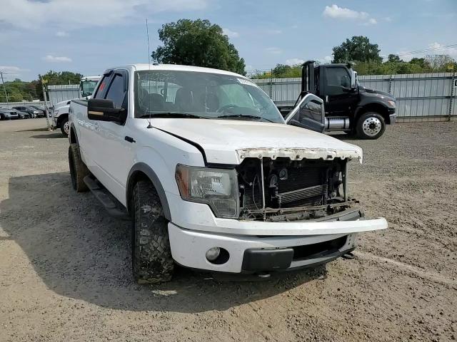 2011 Ford F150 Super Cab VIN: 1FTFX1EF0BFD06916 Lot: 83991925
