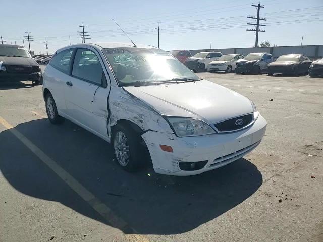 2007 Ford Focus Zx3 VIN: 1FAFP31N37W199348 Lot: 81815605