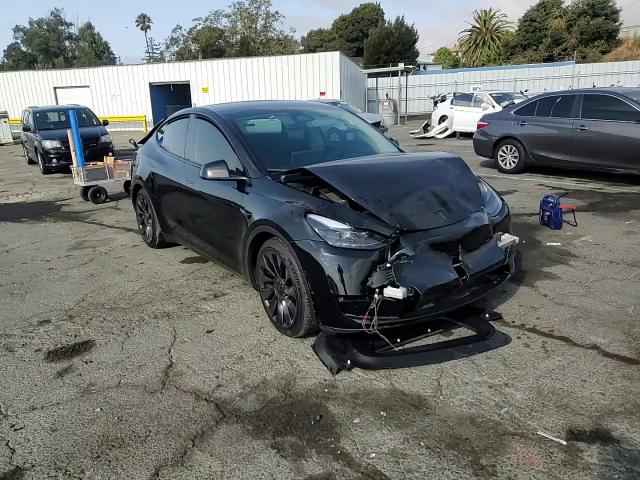 2023 Tesla Model Y VIN: 7SAYGDEF9PF833099 Lot: 80532325