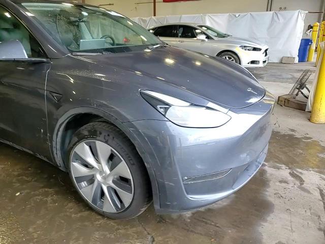 2023 Tesla Model Y VIN: 7SAYGDEE9PA179841 Lot: 82109685