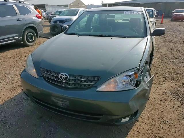 2003 Toyota Camry Le VIN: JTDBE32K030139057 Lot: 71503125