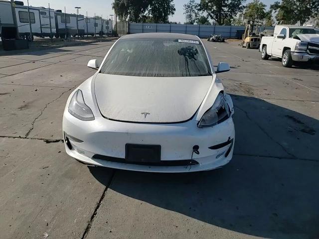 2021 Tesla Model 3 VIN: 5YJ3E1EB0MF002501 Lot: 80330125