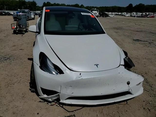 2023 Tesla Model Y VIN: 7SAYGAEEXPF895200 Lot: 80203825