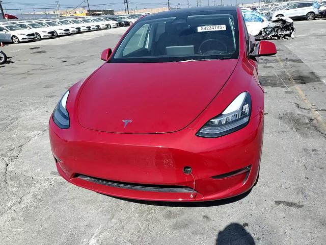 2023 Tesla Model Y VIN: 7SAYGDEE5PA028270 Lot: 84234745