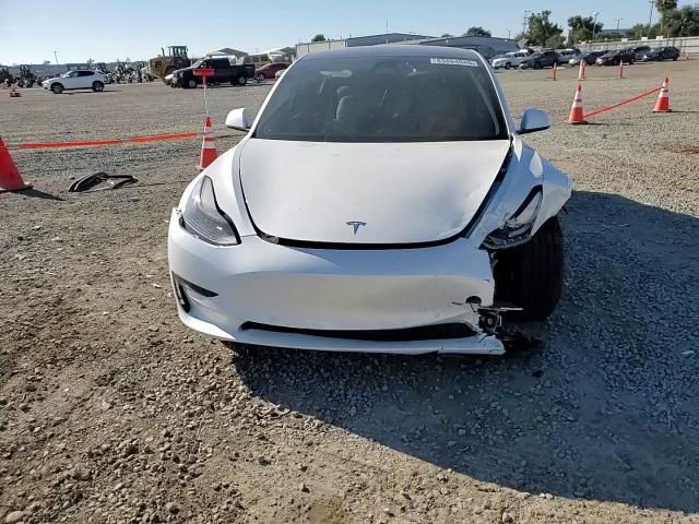 2021 Tesla Model 3 VIN: 5YJ3E1EB3MF876082 Lot: 83864045