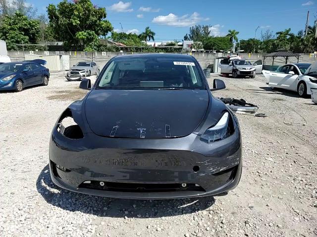 2025 Tesla Model Y VIN: 7SAYGDED3SA371501 Lot: 82126635