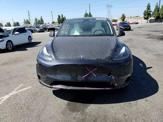 2025 Tesla Model Y VIN: 7SAYGDEF4SF244566 Lot: 71752555