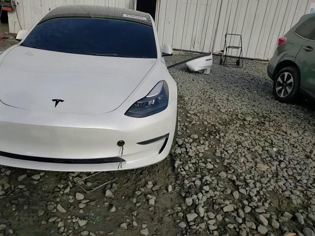2023 Tesla Model 3 VIN: 5YJ3E1EBXPF596549 Lot: 83989405