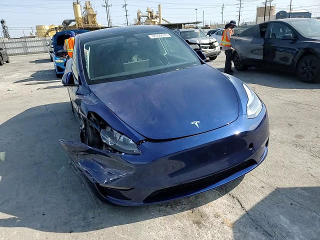 2025 Tesla Model Y VIN: 7SAYGAEE4SF215316 Lot: 80390935