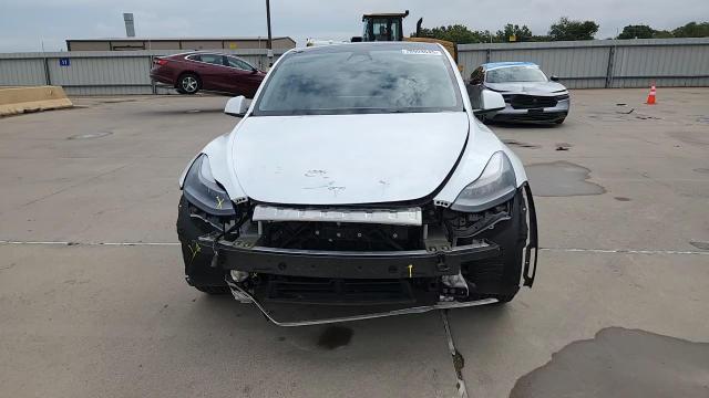 2023 Tesla Model Y VIN: 7SAYGAEE9PF625147 Lot: 70909645