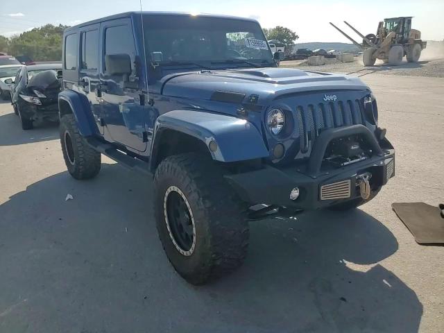 2009 Jeep Wrangler Unlimited Sahara VIN: 1J4GA59169L770214 Lot: 81599695