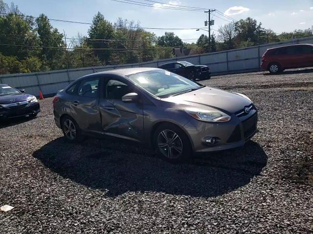 2014 Ford Focus Se VIN: 1FADP3F23EL285246 Lot: 81387005