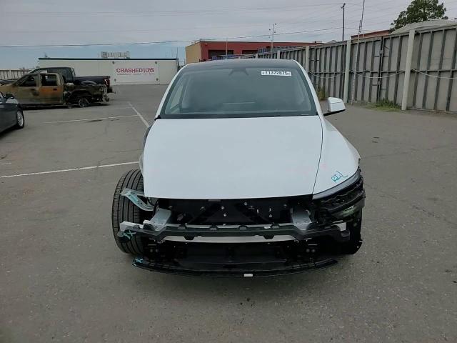 2026 Tesla Model Y VIN: 7SAYGDED5TA449472 Lot: 71372875