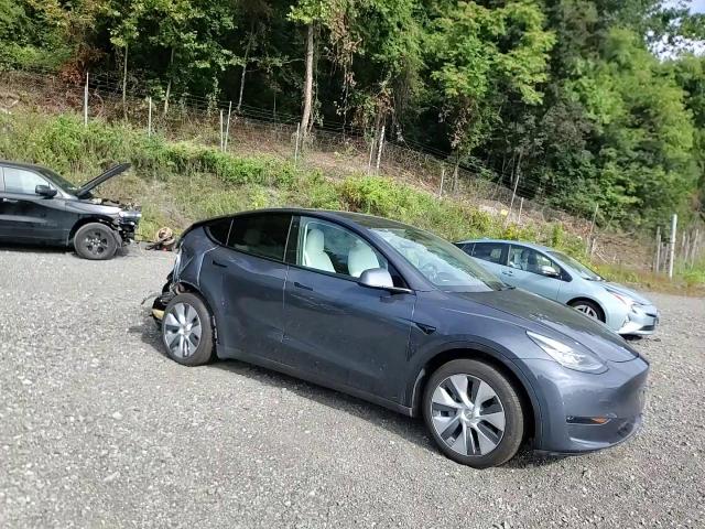 2023 Tesla Model Y VIN: 7SAYGDEE2PA106990 Lot: 71507195