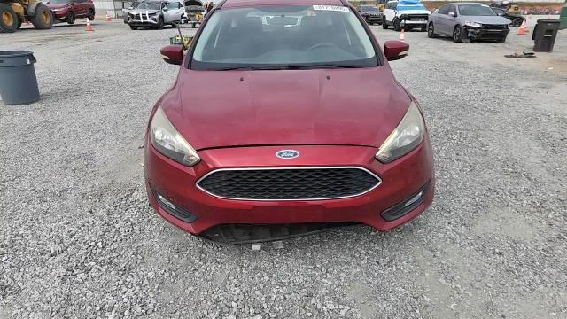 2017 Ford Focus Sel VIN: 1FADP3M2XHL312059 Lot: 81770895