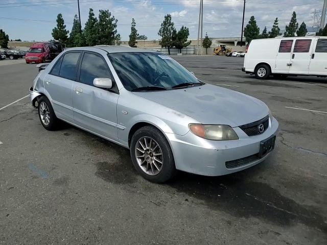 2002 Mazda Protege Dx VIN: JM1BJ225221617049 Lot: 82103005