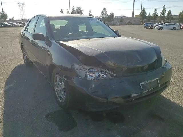 2002 Toyota Camry Le VIN: 4T1BF30K02U006589 Lot: 81859005